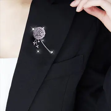 The matching of clothes and brooches